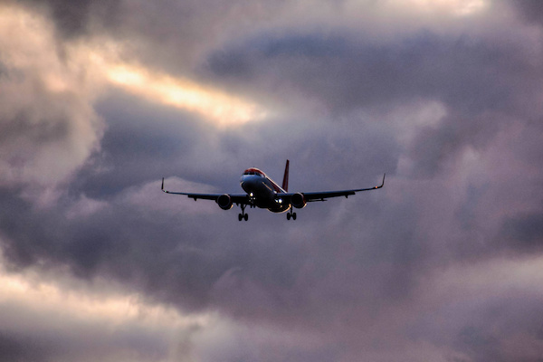 airplane-between-clouds